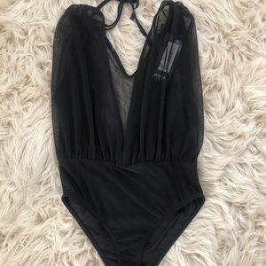 New with Tags Nasty Gal mwah body suit.